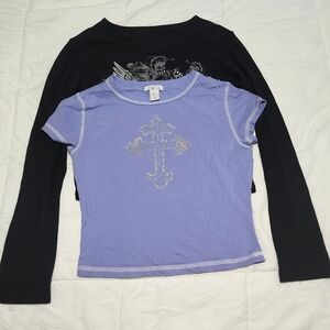 2 cropped tops worn.